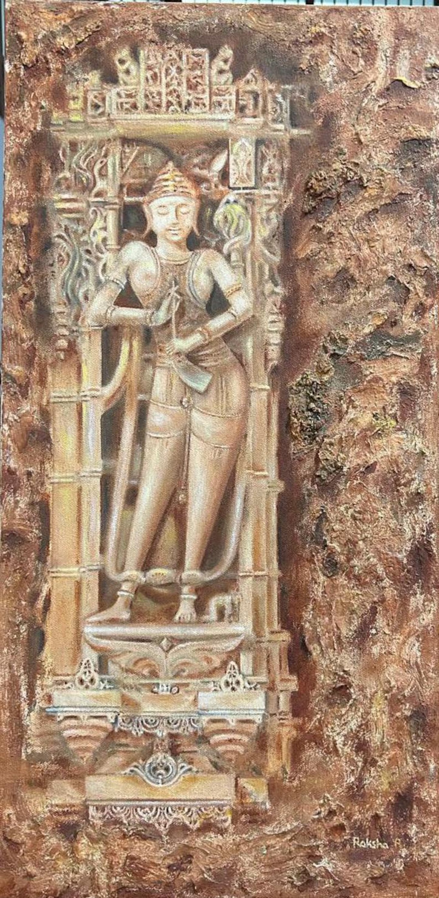 Carved stone panel with a figure in a detailed architectural setting